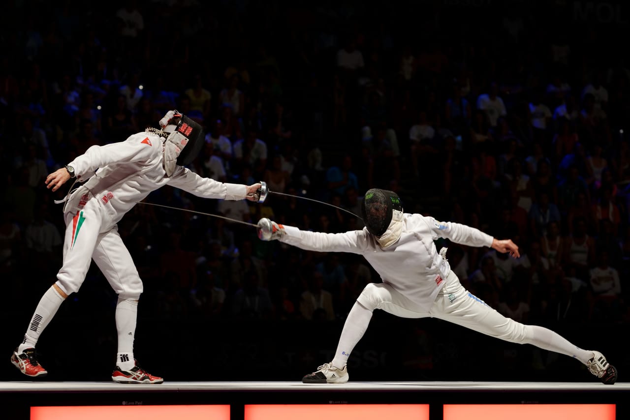 Adult epee fencers training at NCF Boulder